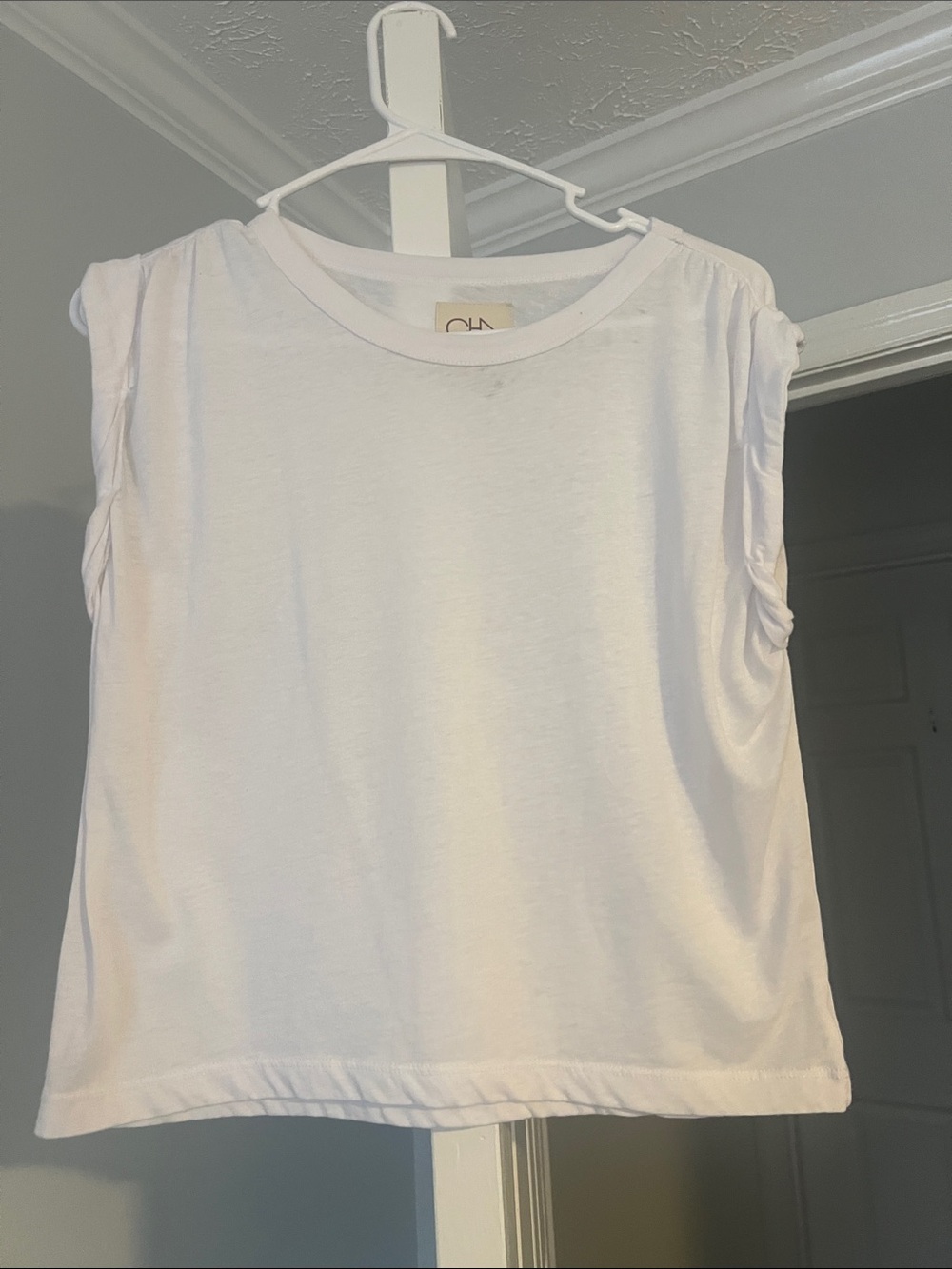 Chaser White Sleeveless Tank Top by CLN